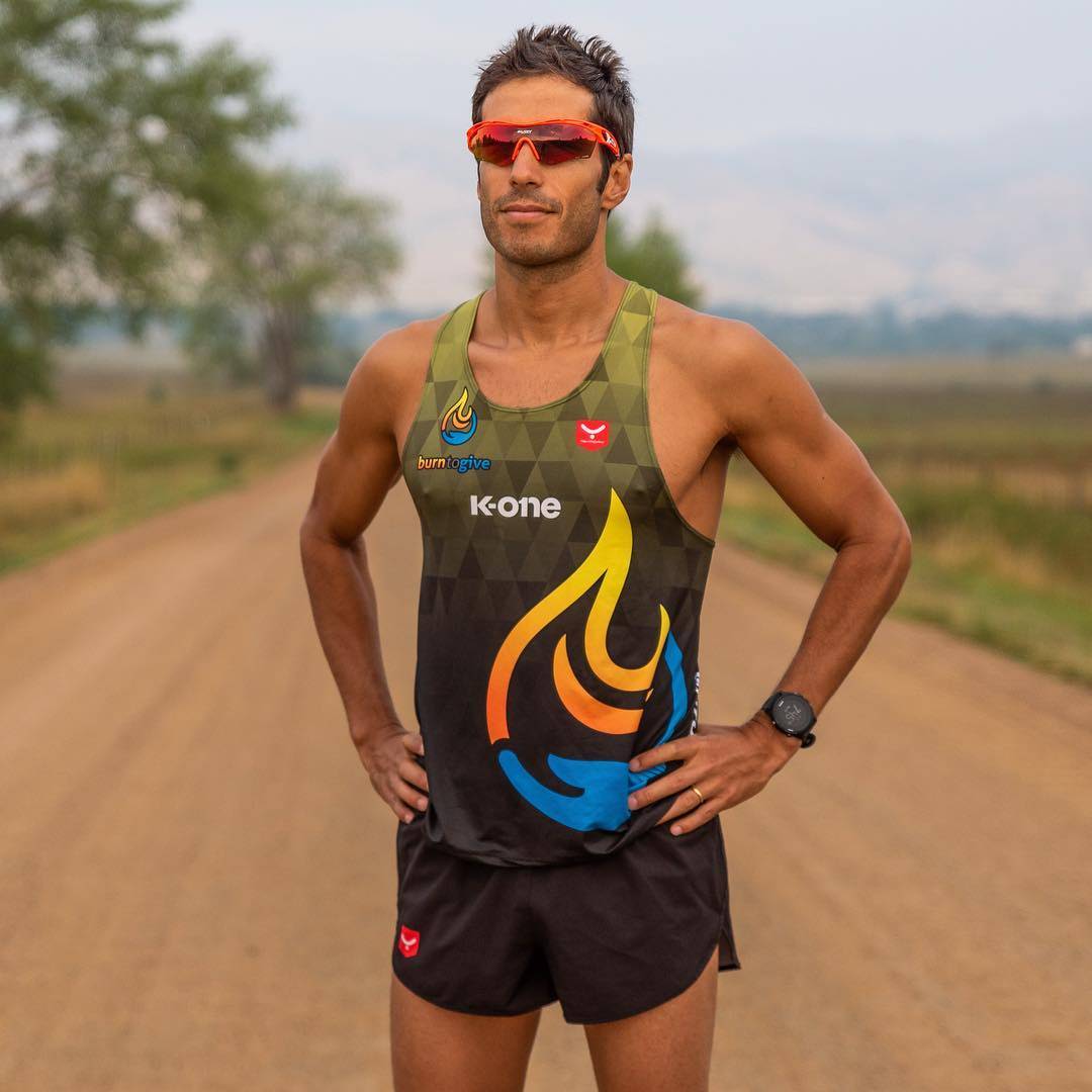 Eduardo posed on gravel road during a run