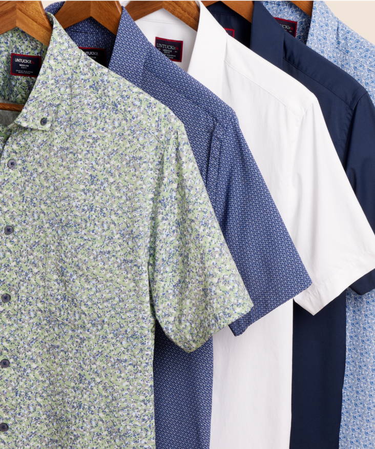 Collection of UNTUCKit short sleeve shirts in various colors and patters, 