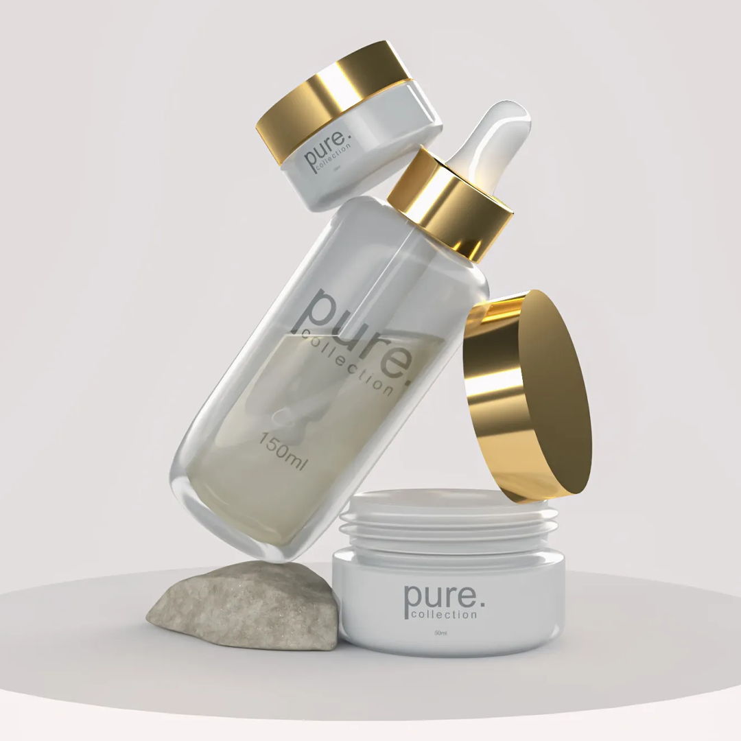 Three skincare products with gold accents on a neutral background.
