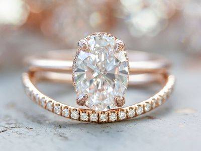 oval hidden halo engagement ring