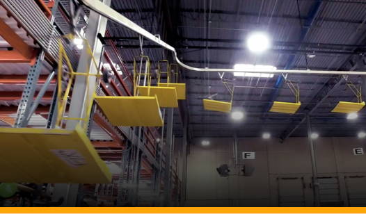 overhead conveyor wiht yellow platforms