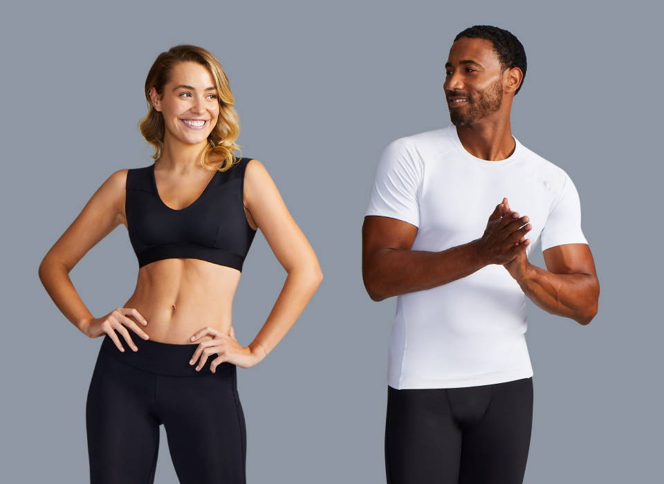 A woman and a man wearing Tommie Copper compression