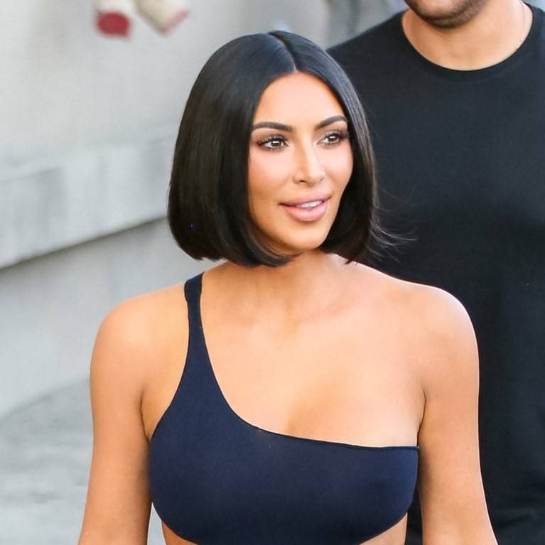 Kim Kardashian with a sleek black middle parted blunt bob