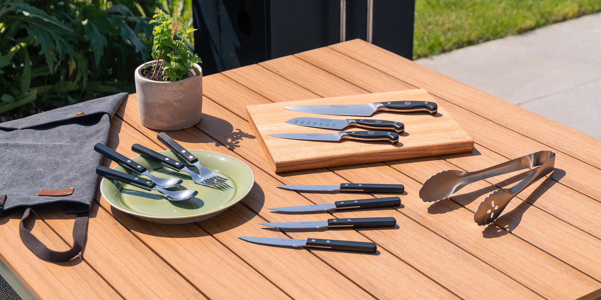 Professional Home Chef’s Knife Set, Trattoria Bright cutlery set for six people, Trattoria Bright steak knives, Radford Satin Extra-Large Chef’s Tongs, and a super-smart Apron