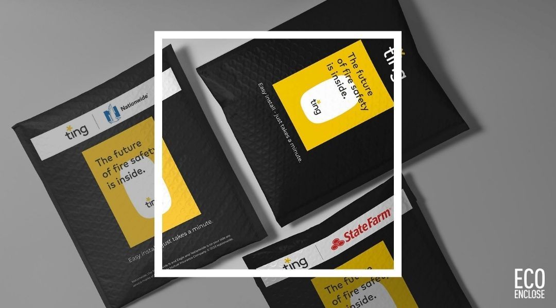Three black packages with yellow labels on a gray background.
