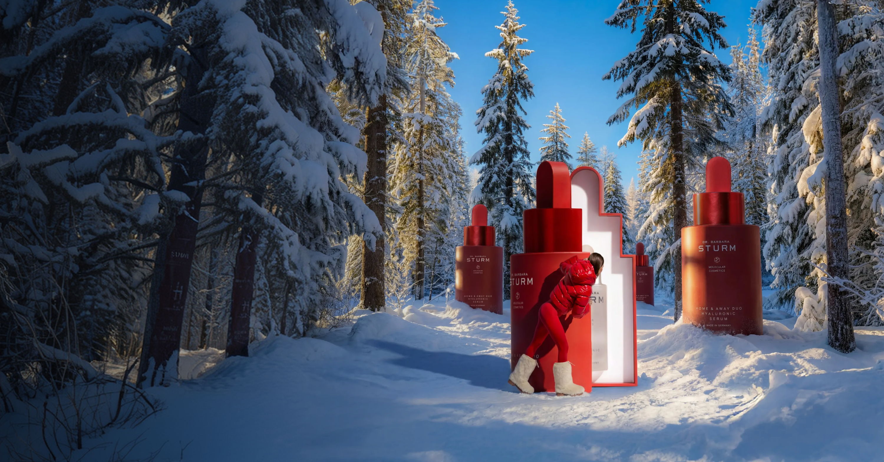 Red gifts in a snowy forest with tall trees.