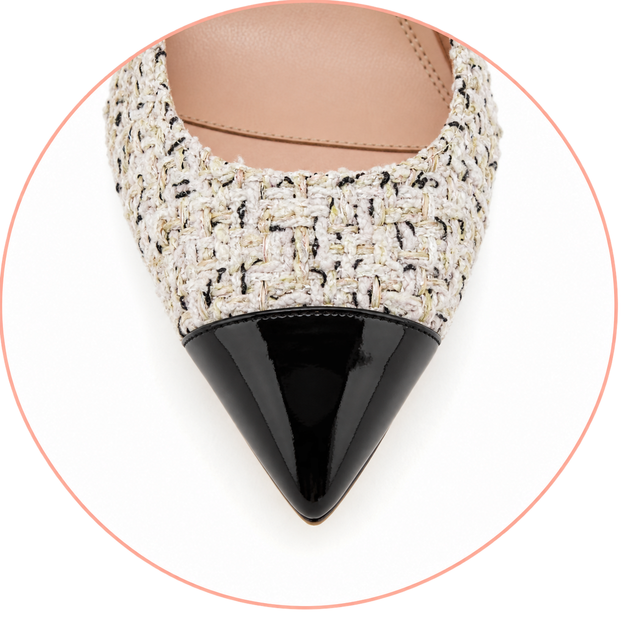 Close-up of a stylish pointed-toe ballet flat shoe.