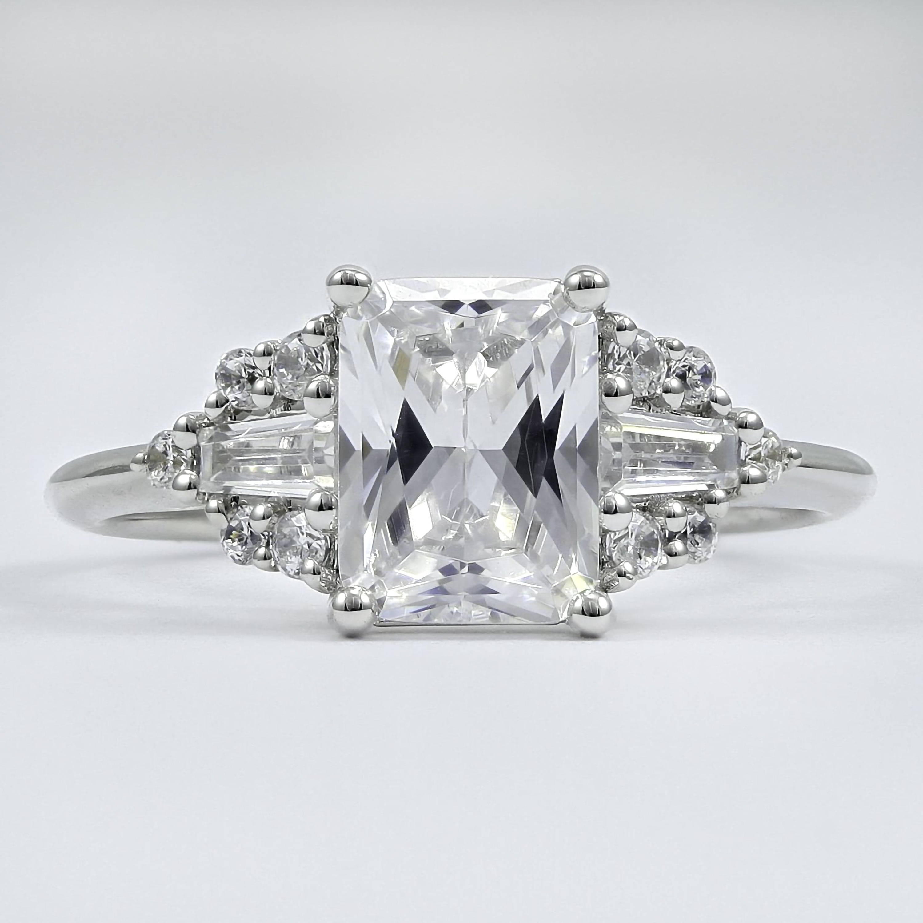 Classique Creations three stone diamond ring