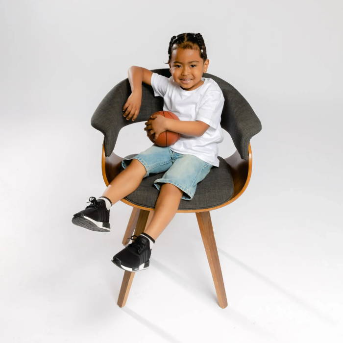 boy sitting on chair