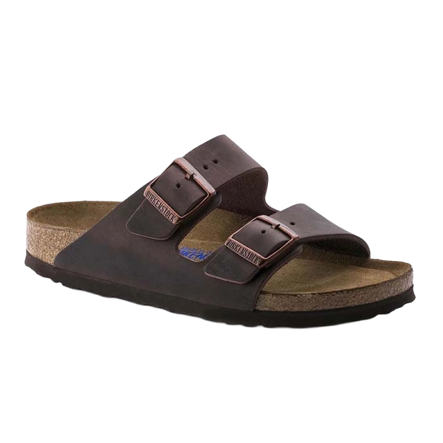 Brown double-buckle sandal on a light background.