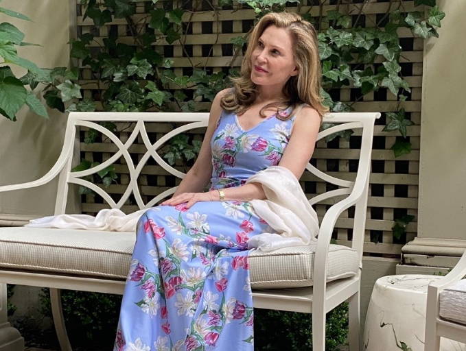 Cathy Graham wearing bouquet flower printed lavender v neck stretch knit long dress by Ala von Auersperg for spring summer 