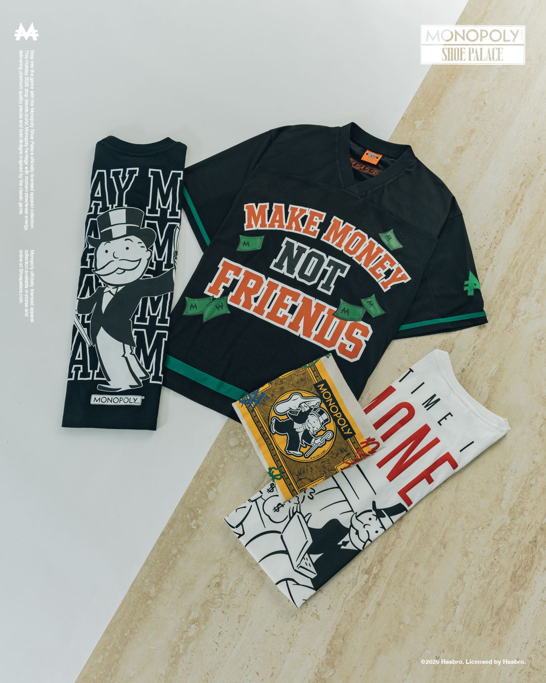 Clothing items displayed on a wooden surface, featuring slogans and designs.