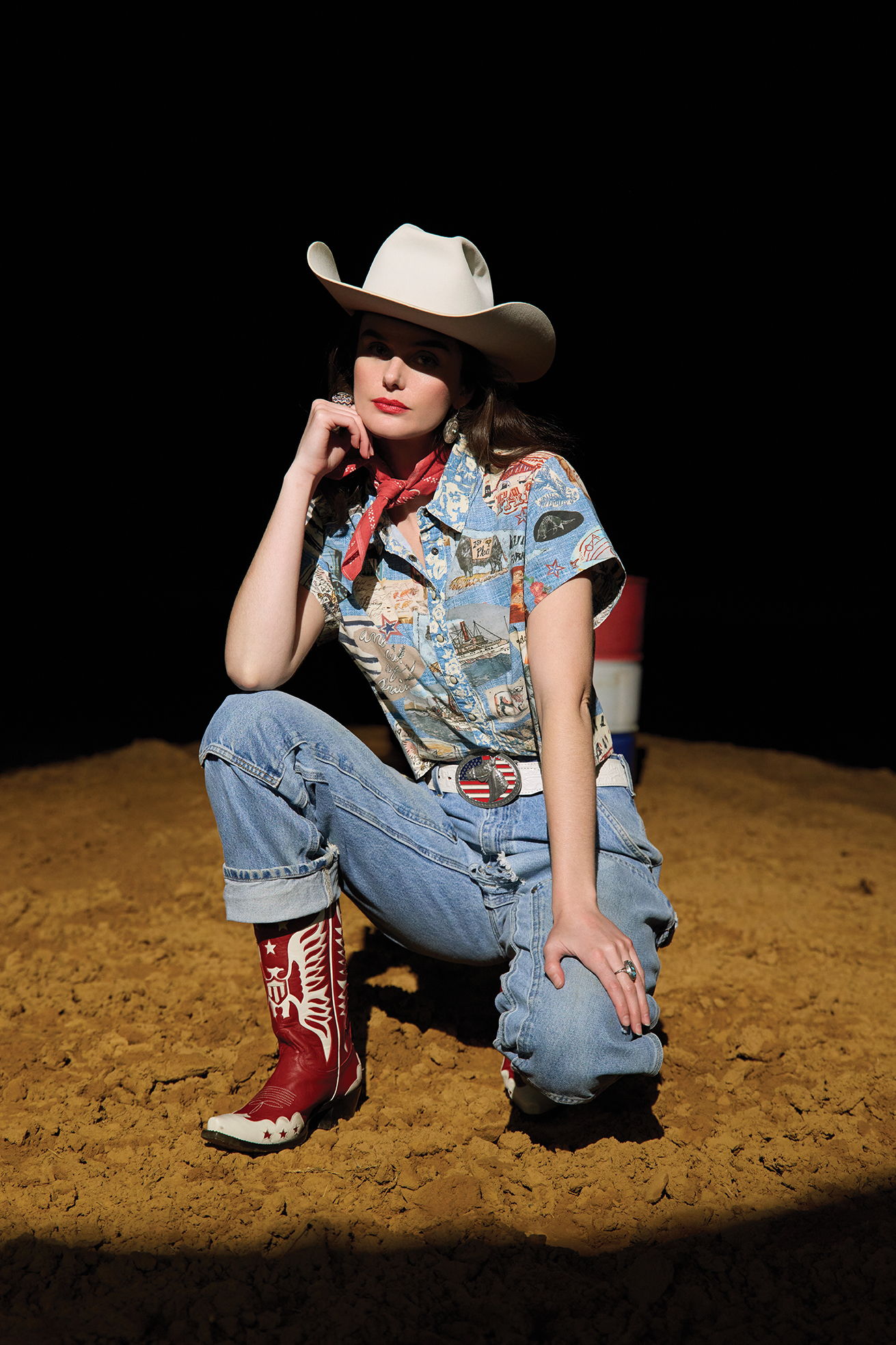 Kaylin wearing the Sea to Shining Sea top with the red Highflier boots and vintage Carharrt jeans.