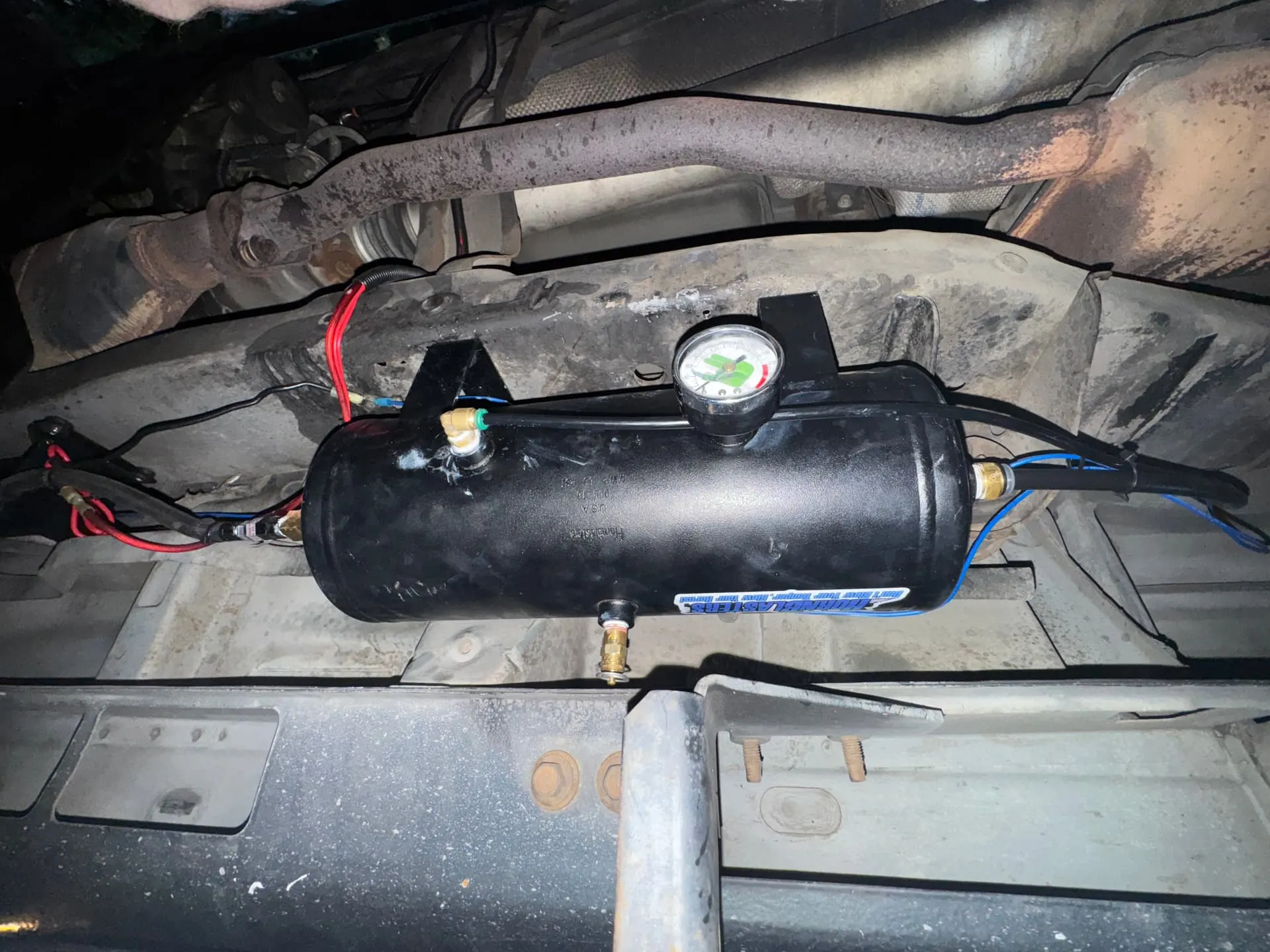 HornBlasters black air tank with pressure gauge mounted on Joshua's Ford Ranger undercarriage near exhaust photo 4