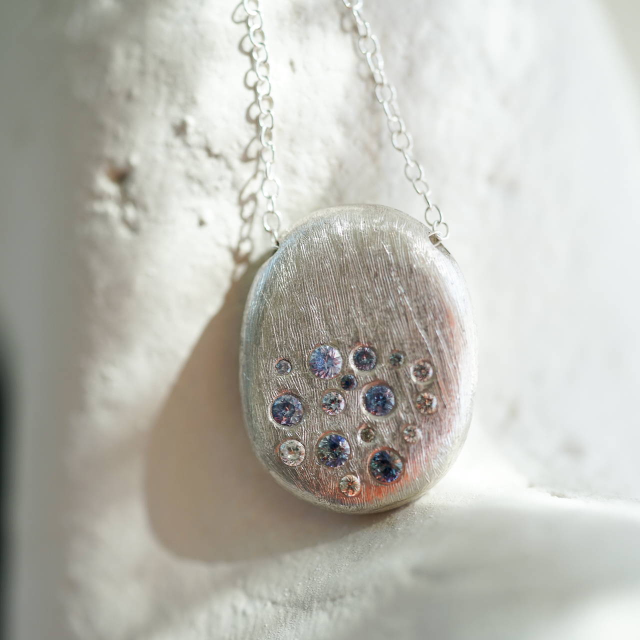 starburst necklace silver white and blue sapphires