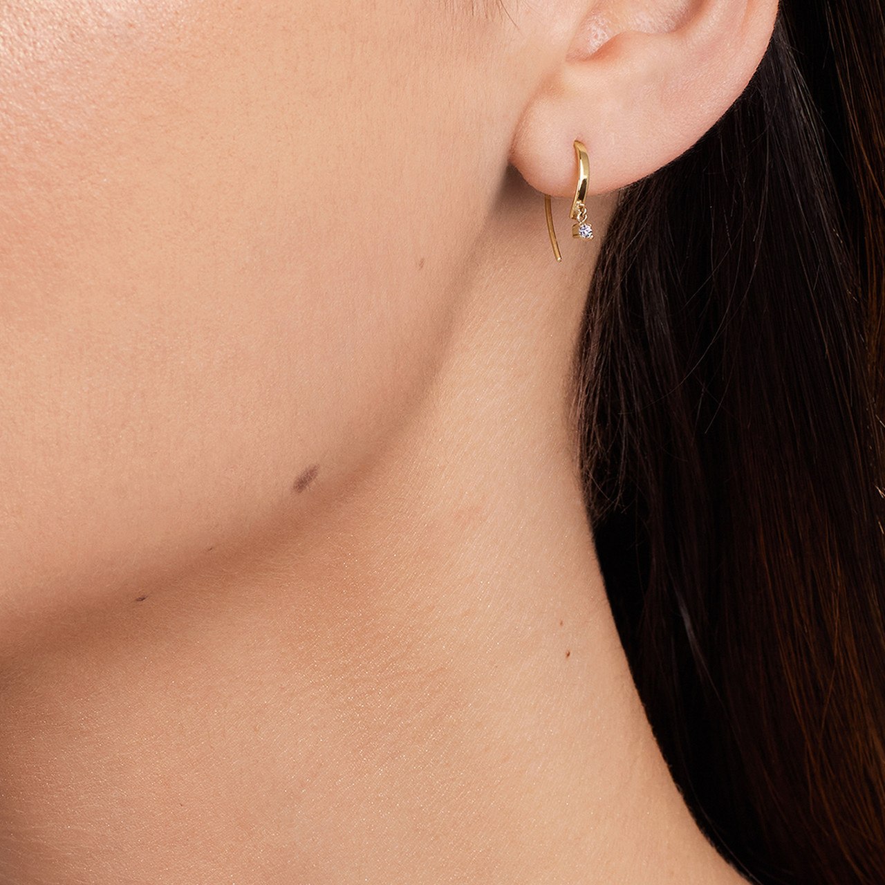 Model wearing Lana hoops.