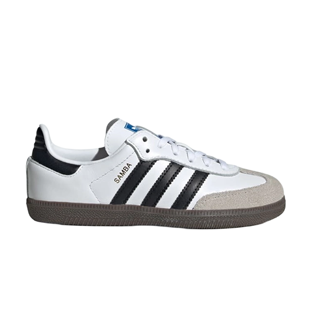 White sneakers with black stripes and gray sole.