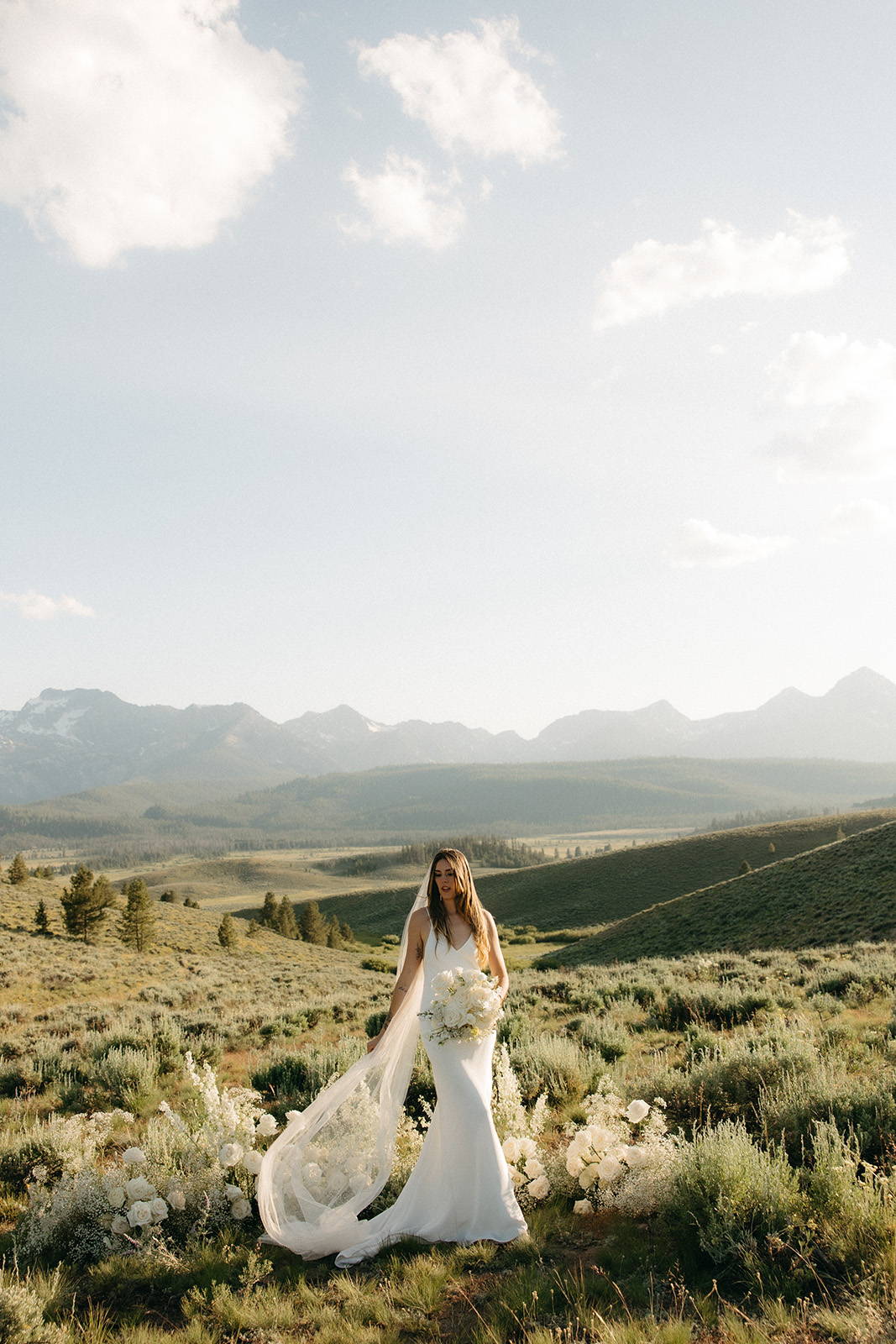 Bride in the Summer gown in the mountains