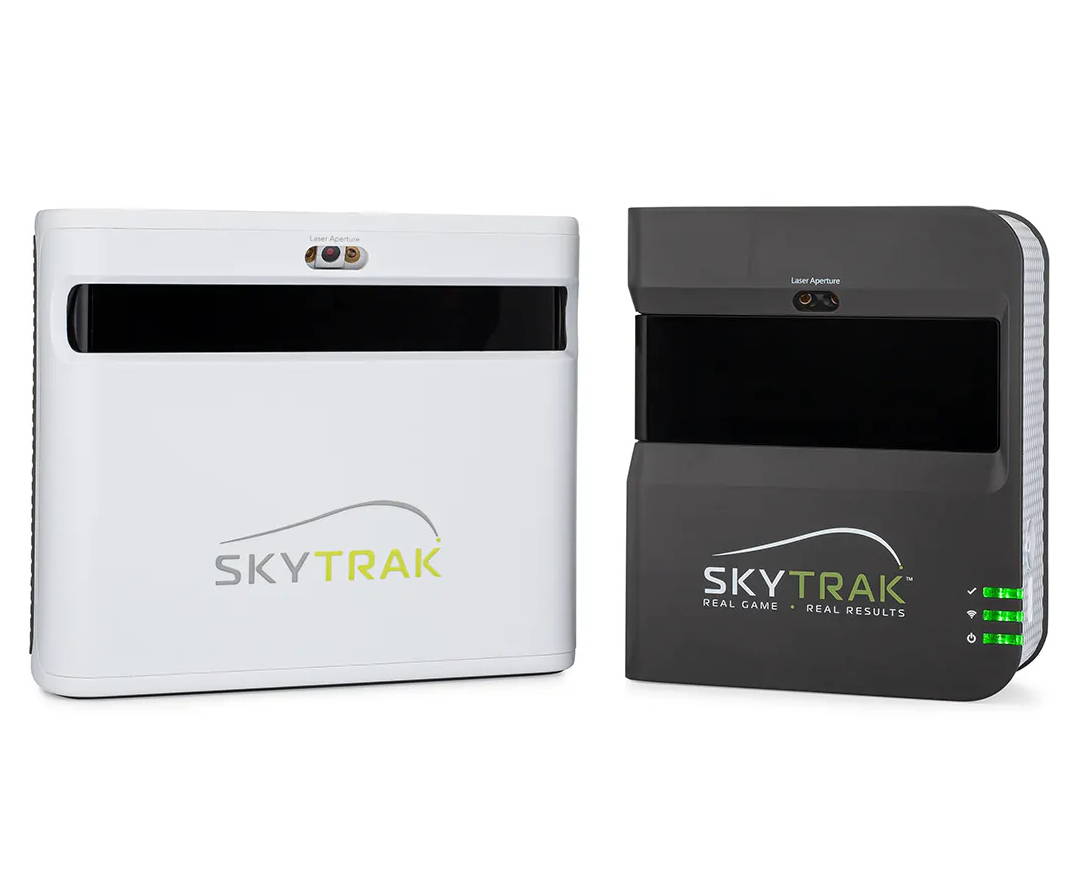 An image of the white Skytrak+ golf launch monitor next to the dark gray original SkyTrak unit