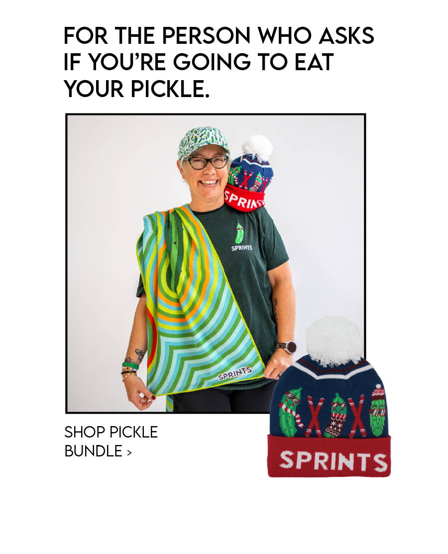 Woman with pickle towel and hat