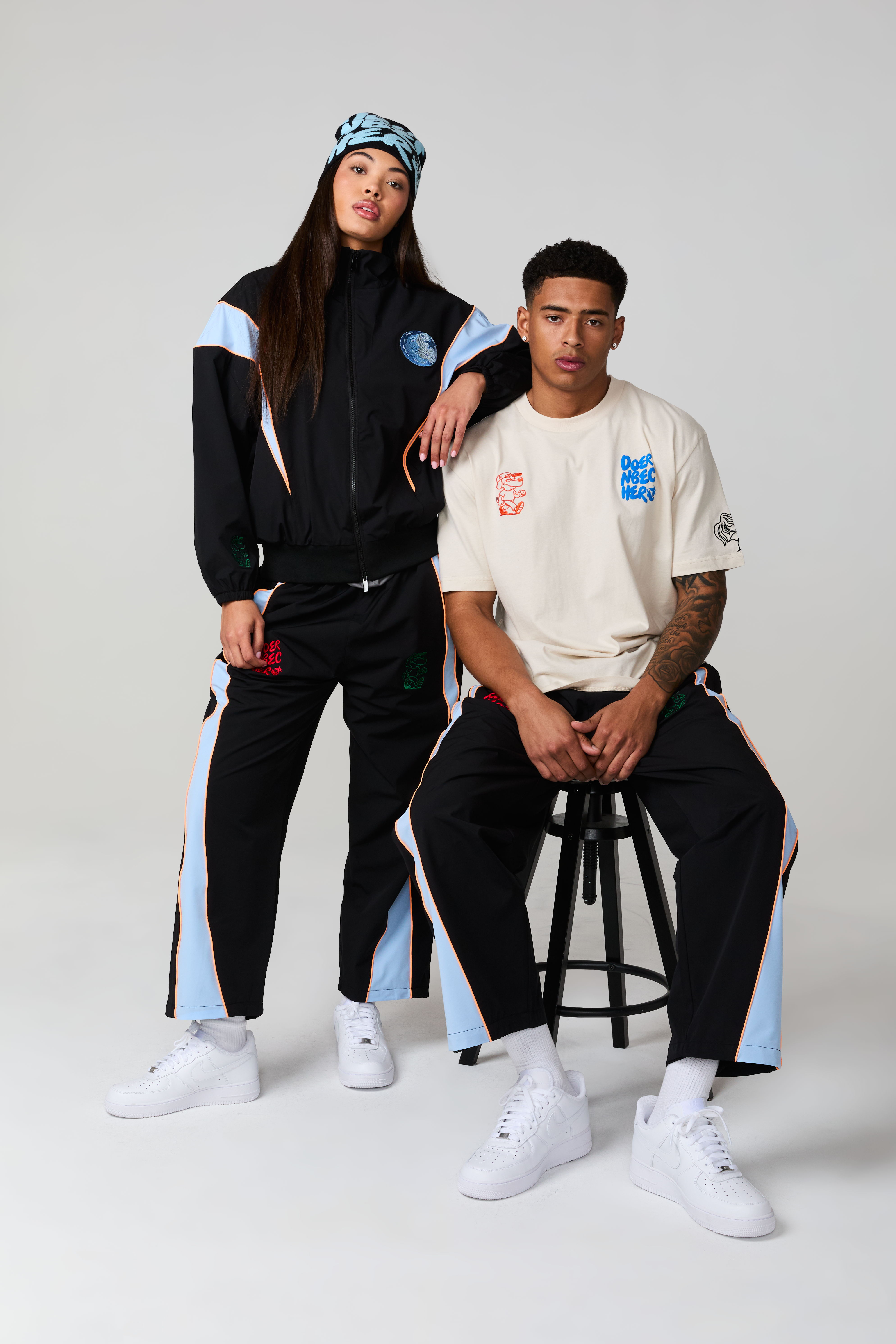 Two models wearing sporty outfits, standing and sitting against a neutral background.