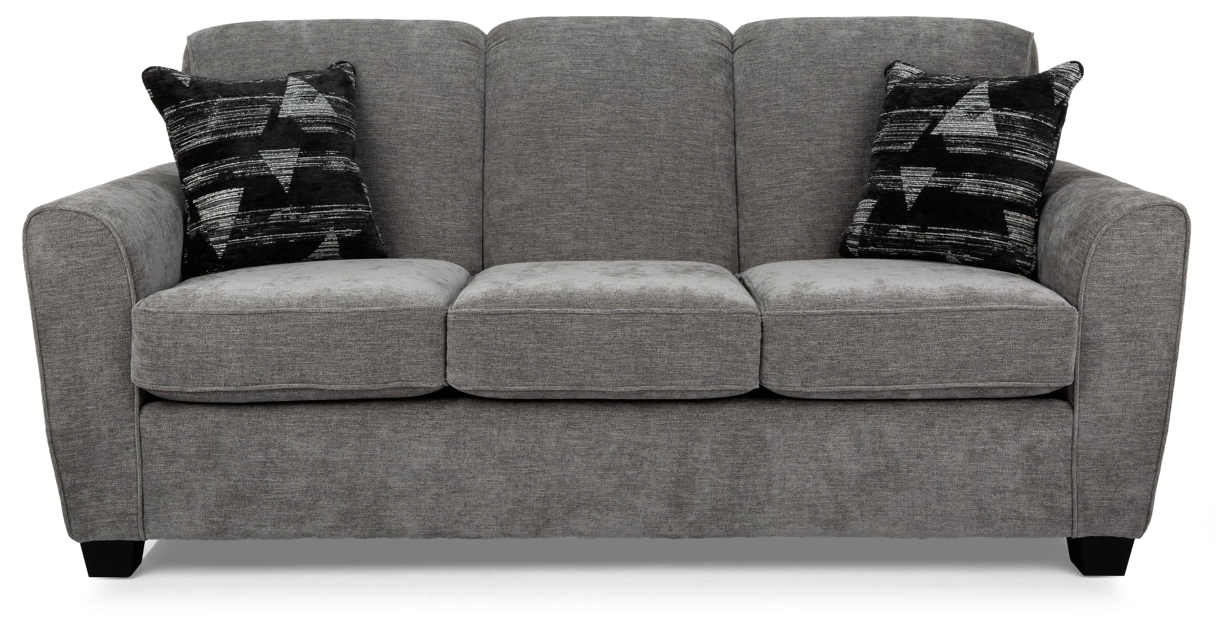 Gray sofa with two decorative black pillows.