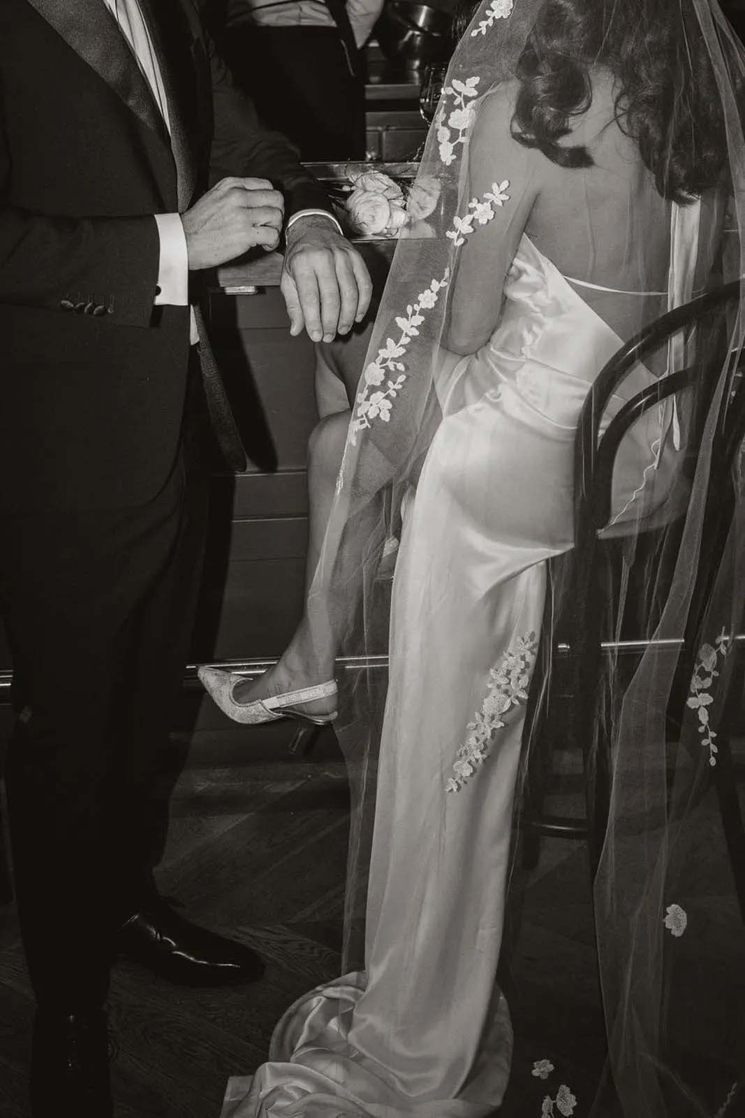 Groom and bride wearing Goldie