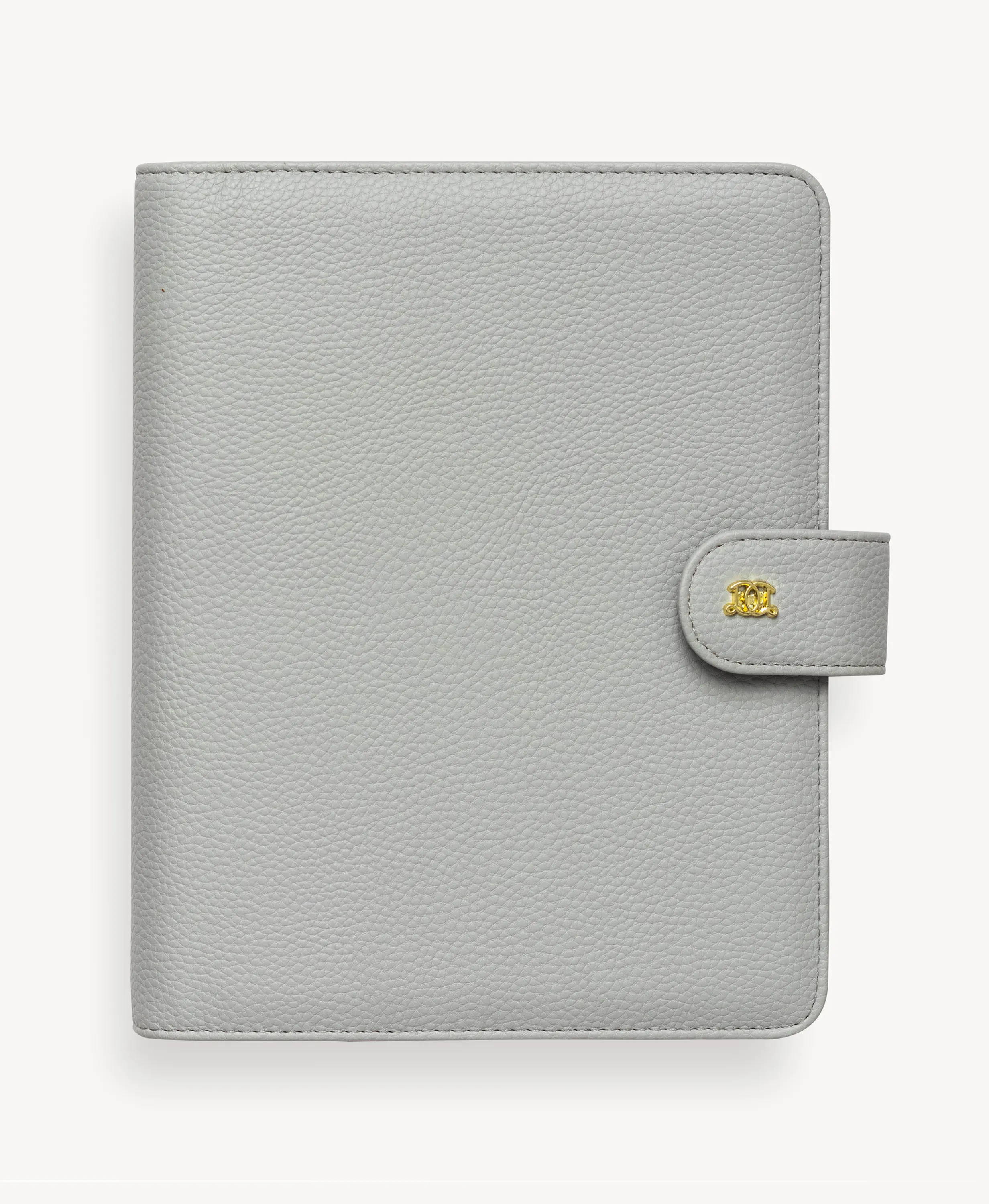 gray a5 planner, closed cover with snap closure and gold day designer logo