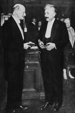 Figure 1a (left) Max Planck presents Einstein with the 1929 Planck Medal for extraordinary achievements in theoretical physics.