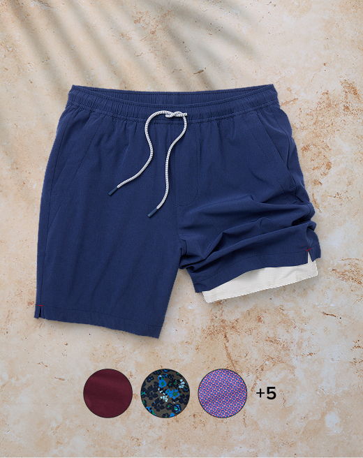 Navy shorts with white lining and color options below.