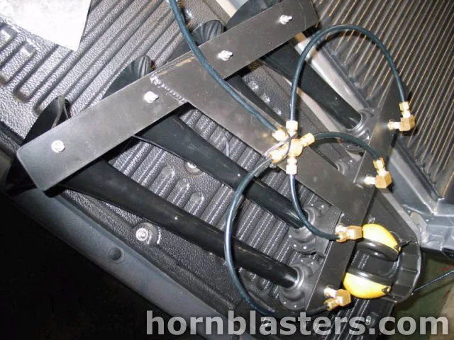 Three black Shocker XL train horns brass manifold black air lines truck bed liner mounting bracket Lance's 1999 Tundra install gallery photo 2
