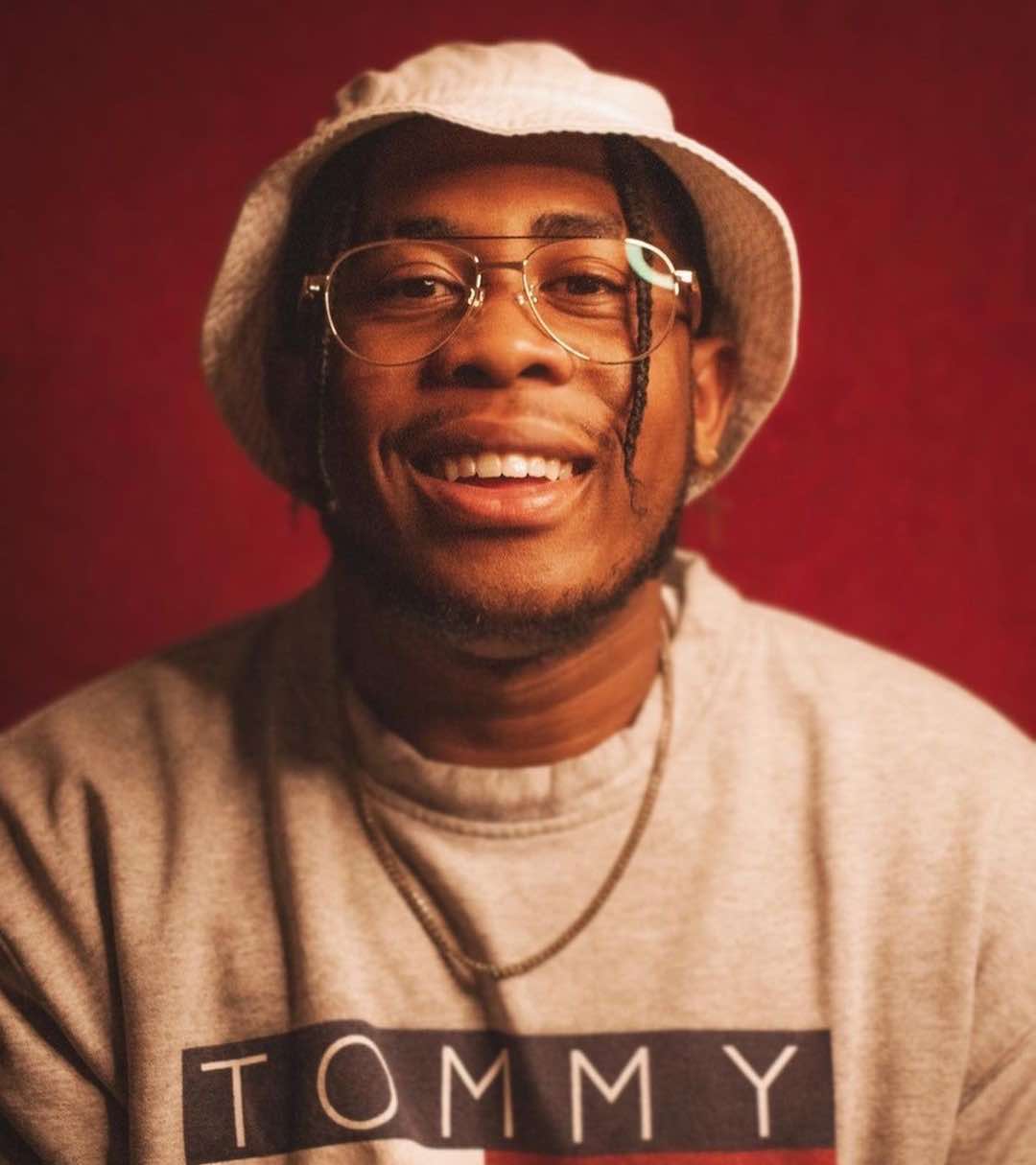 man with low nose bridge wearing Purpose Gold aviator glasses