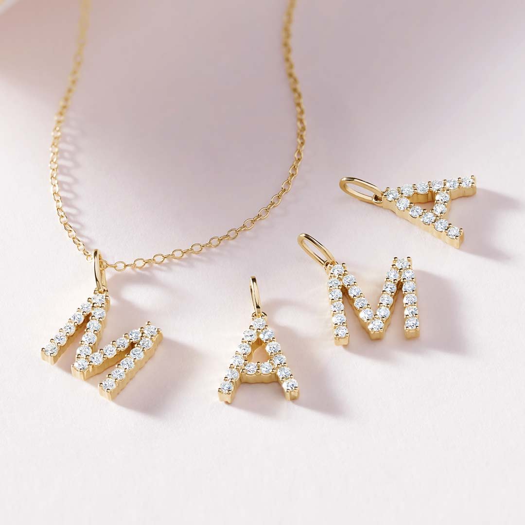 Diamond alphabet charms that spell Mama