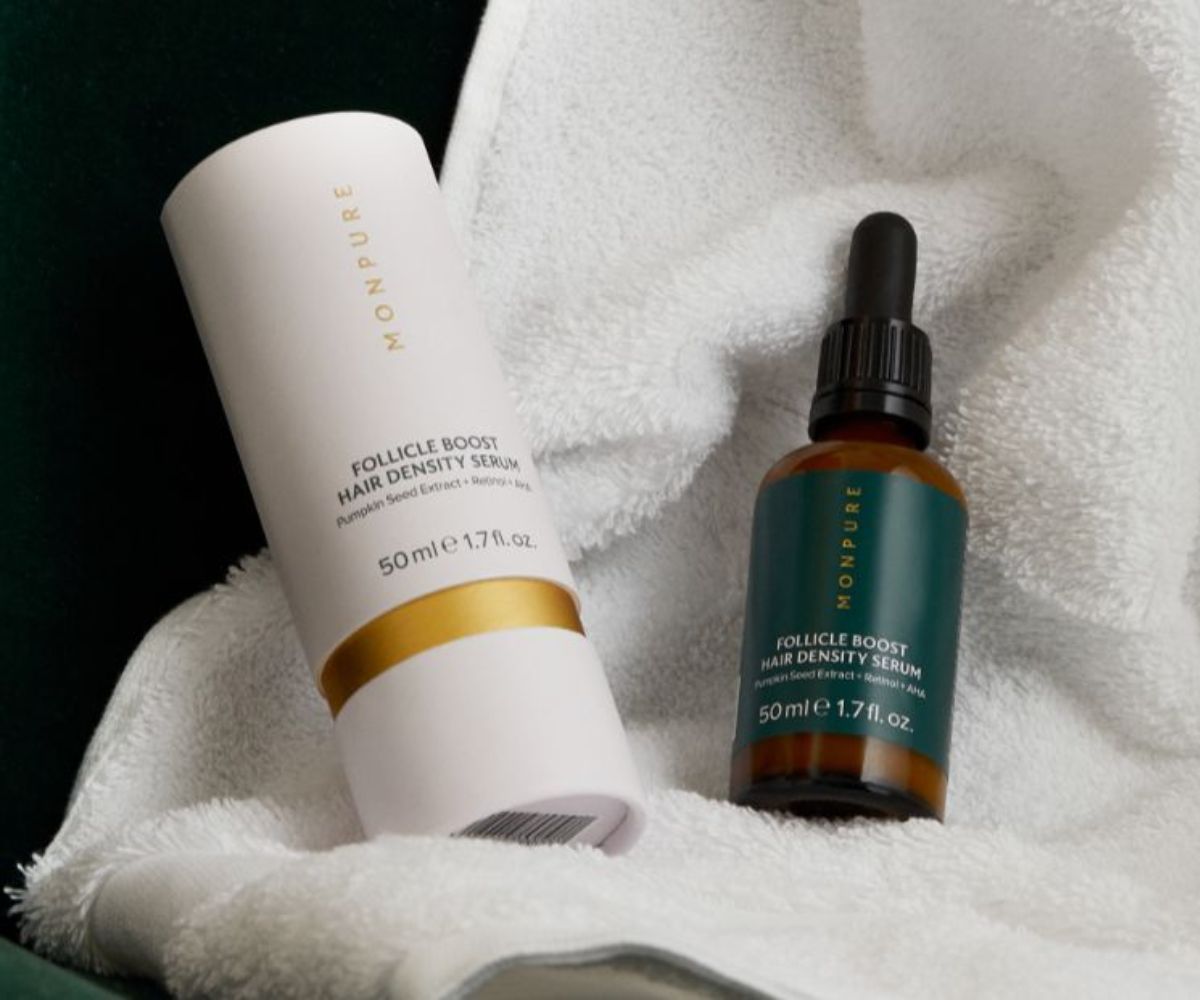 Monpure Follicle Boost Hair Density Serum on a white towel.