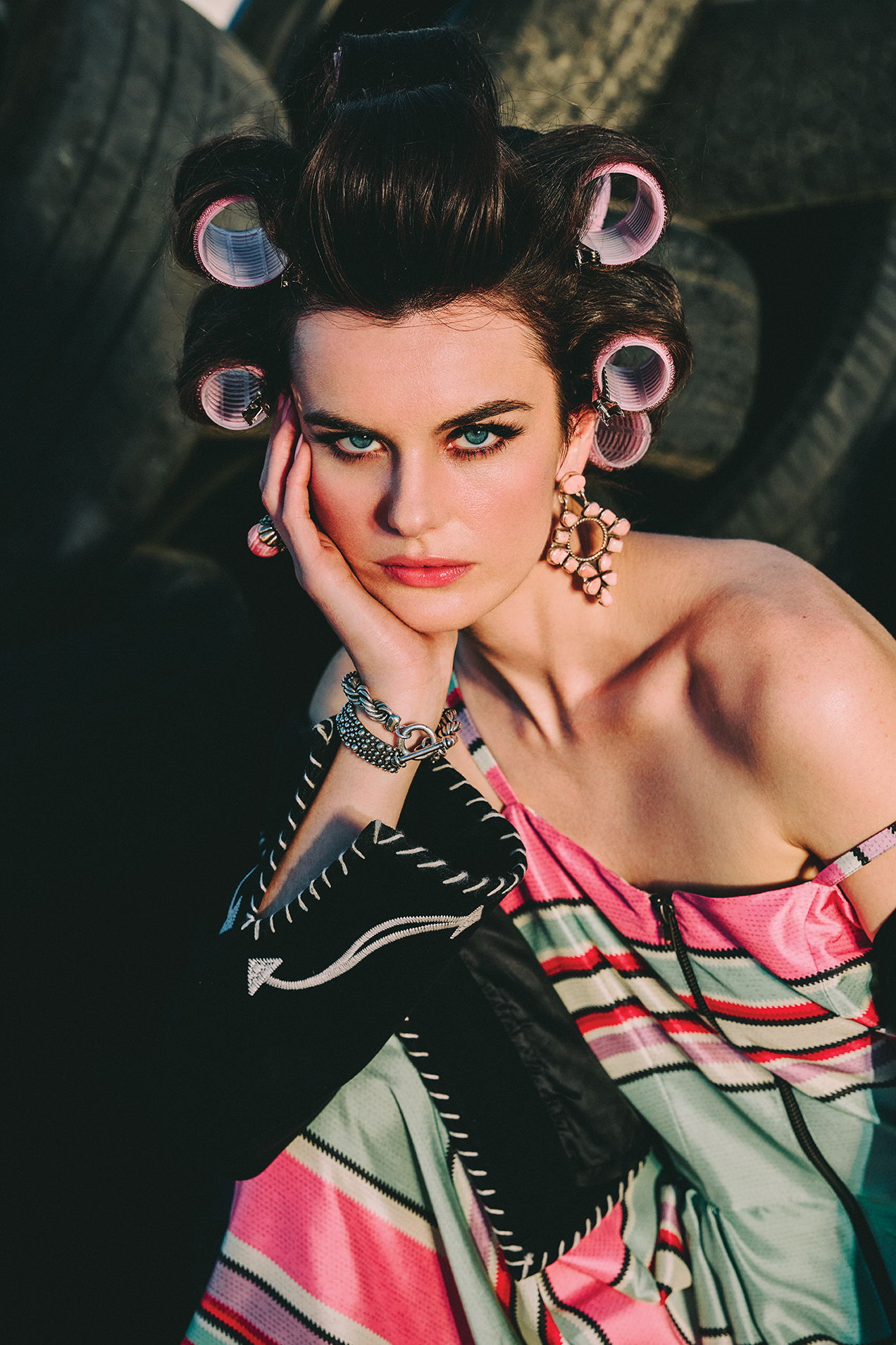 Kaylin wearing the Round Top Serape Dress with the Underground Hootenanny Jacket in black and Oscar Betz earrings.