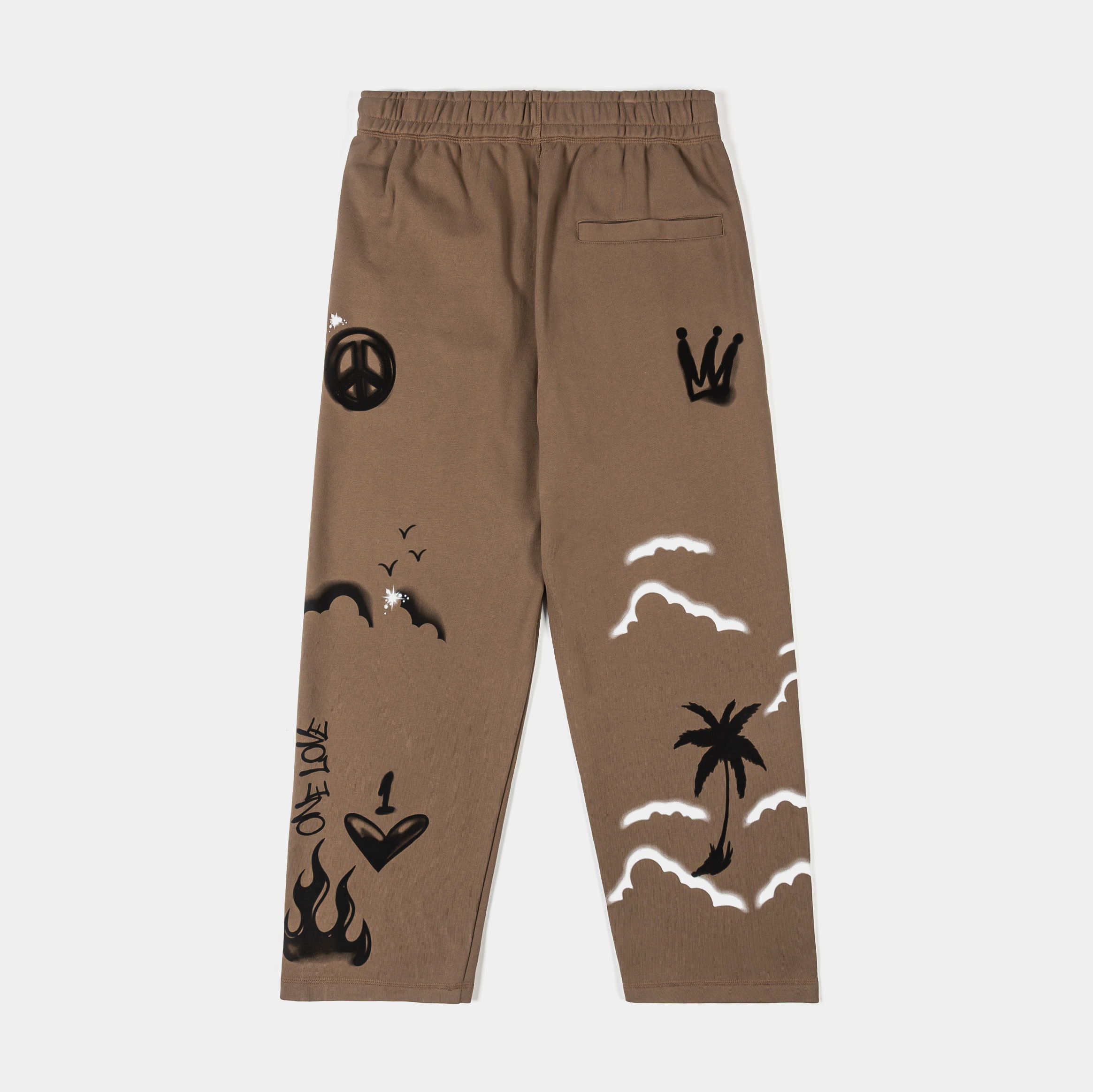 Brown pants with various graphic designs and patches.