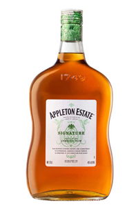 Bottle of Appleton Estate Signature rum with a green label.