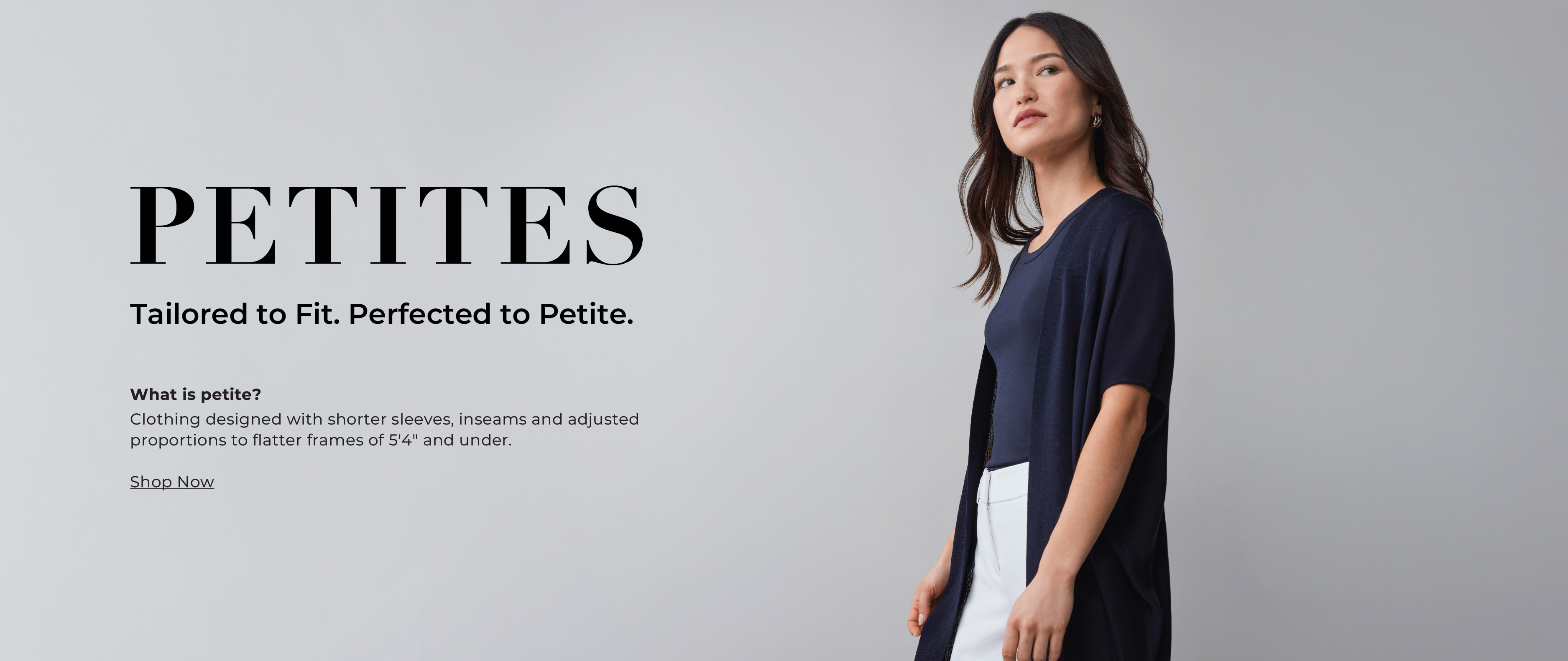Woman in stylish clothing promoting petite fashion collection.