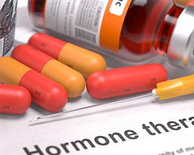 Hormone pills and syringe