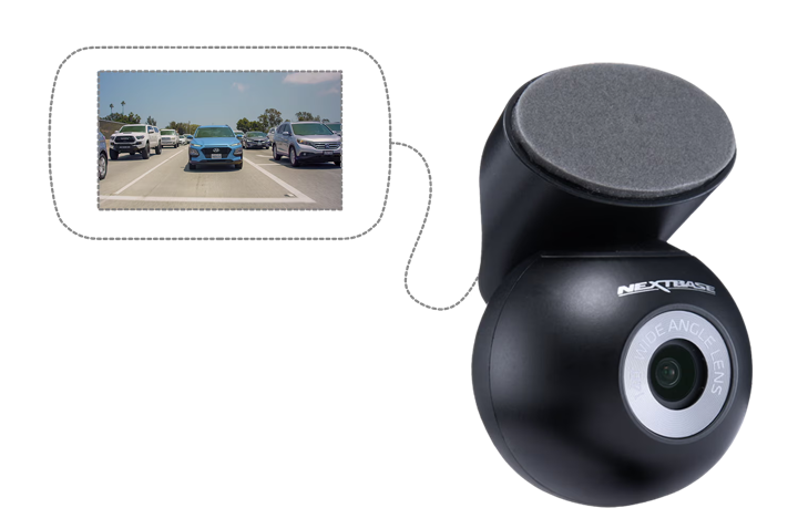 Dashcam connected to a smartphone displaying a road view.