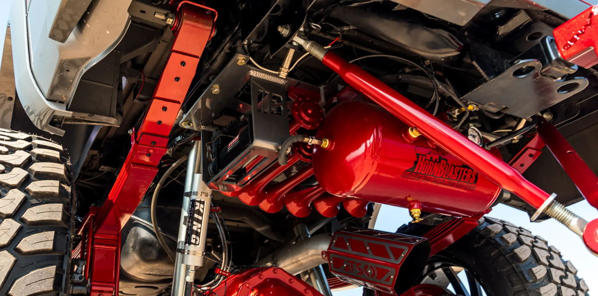 HornBlasters train horn kit installed under a vehicle