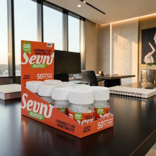 Display of Sevn drink bottles in a modern office setting.