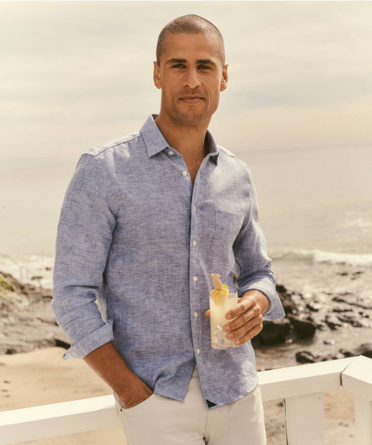 Model is wearing UNTUCKit Vin Santo button down. 