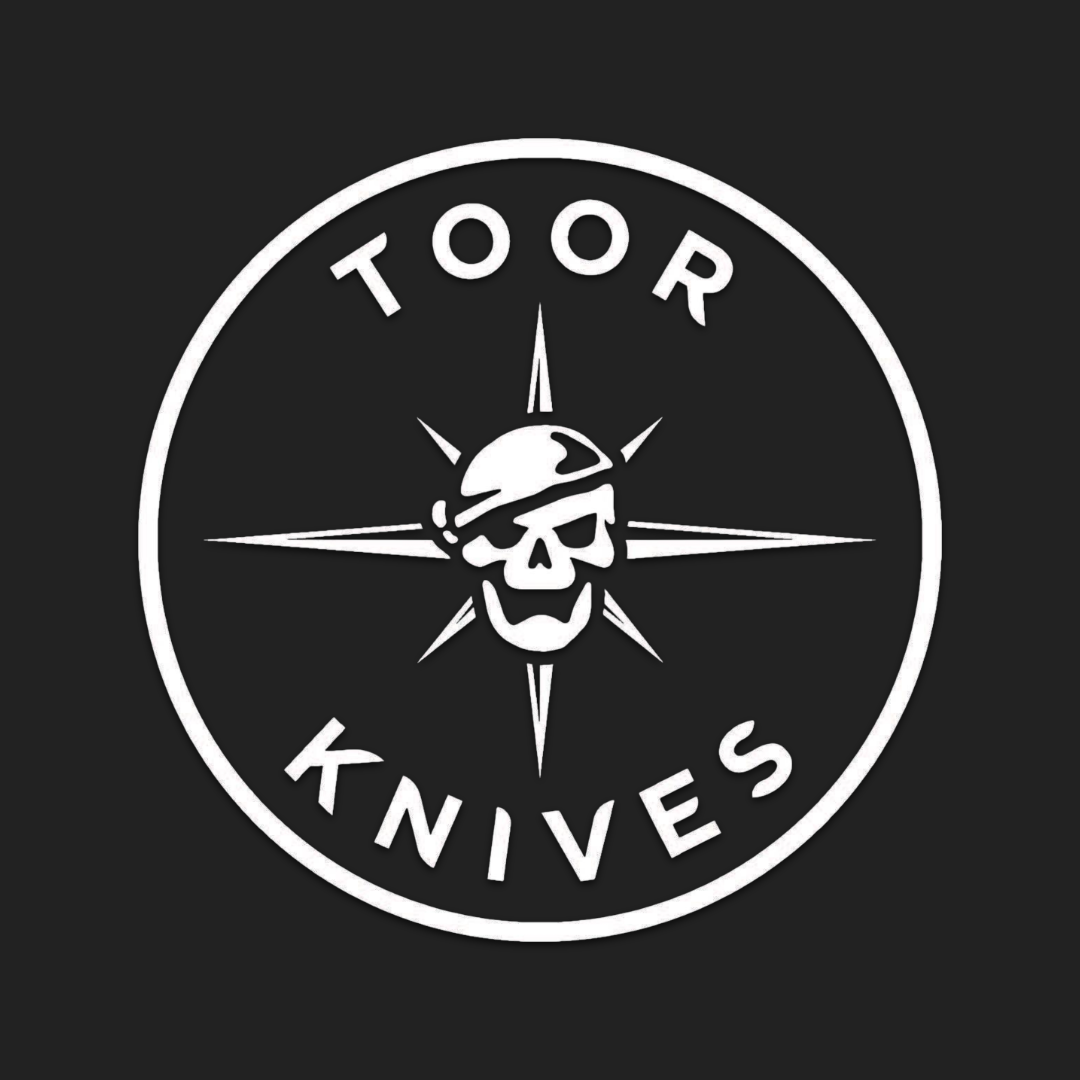 Logo of Toor Knives featuring a skull and compass design.
