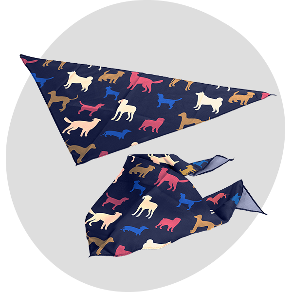 Navy blue bandana printed with a colourful illustrated dog pattern in pink, orange, and gold