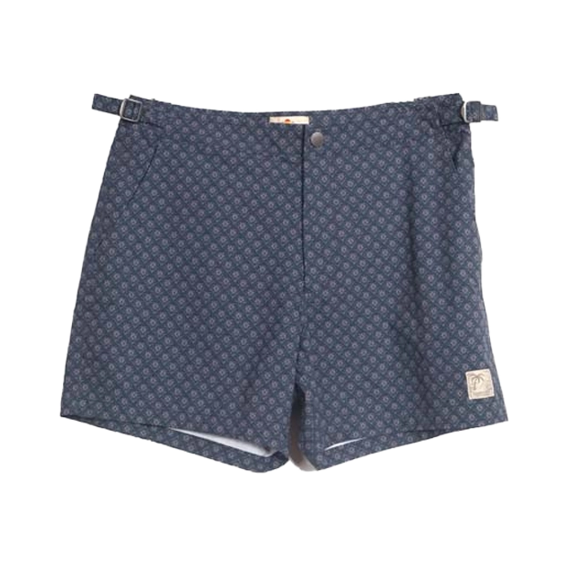 Blue patterned swim shorts displayed on a white background.