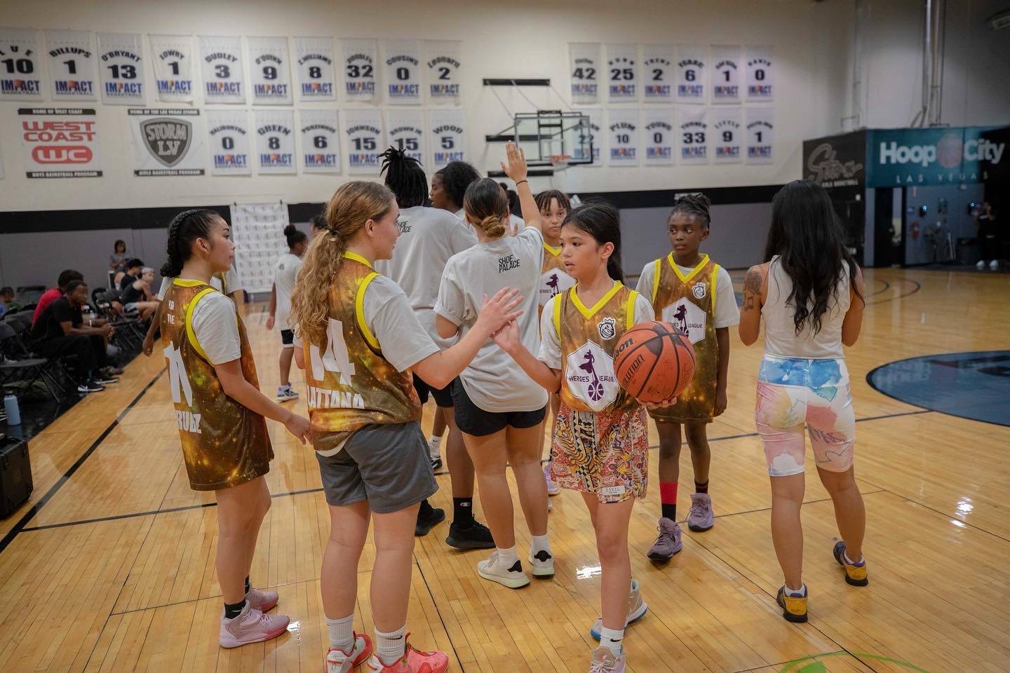 heroes basketball league girls celebrating