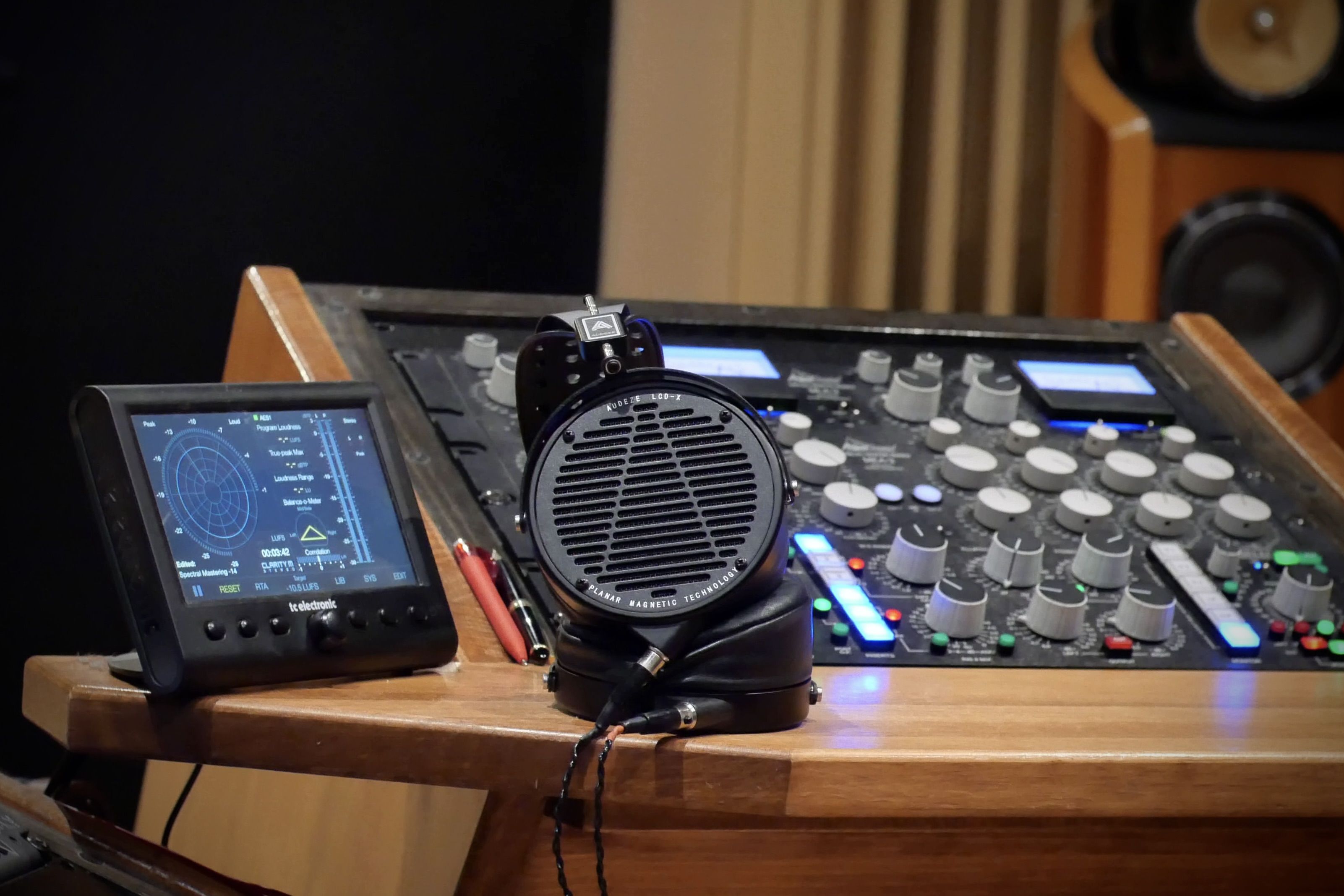 Audeze LCD-X headphones laying on the table In the studio