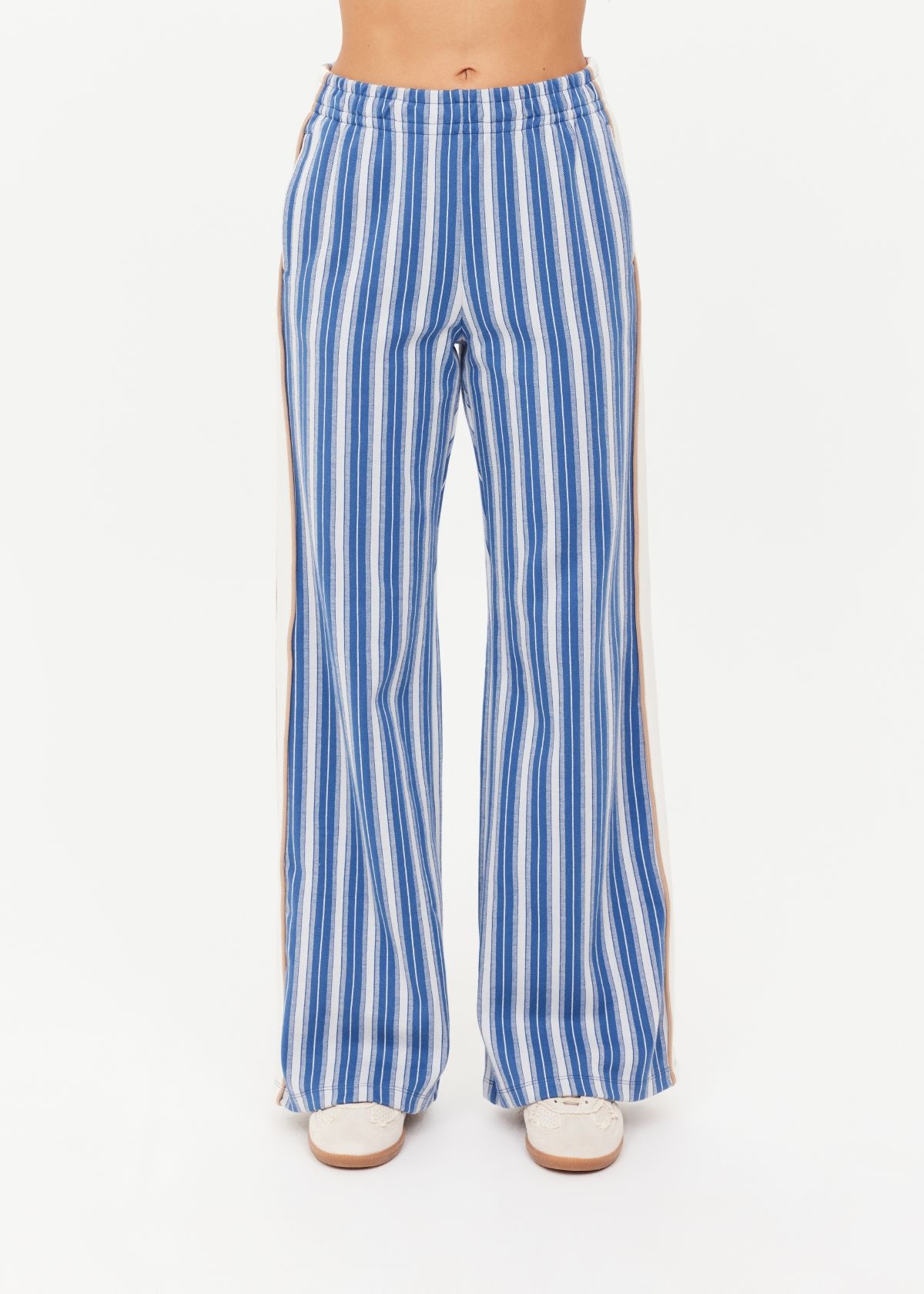 Striped blue wide-leg pants worn by a model.