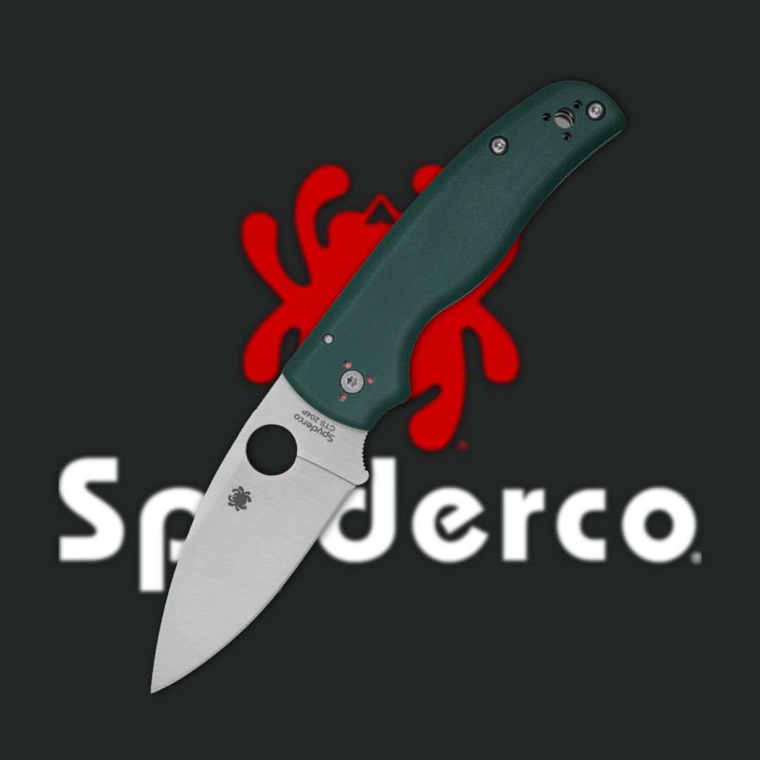 Green handled knife with a silver blade and Spderco logo.